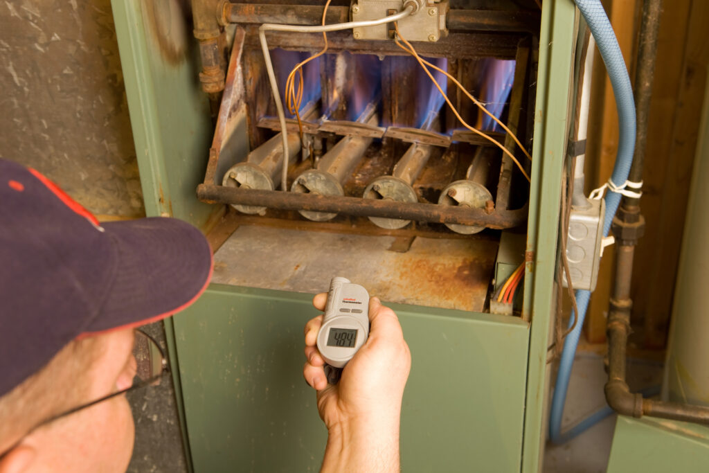 Tech Working on Gas Furnace